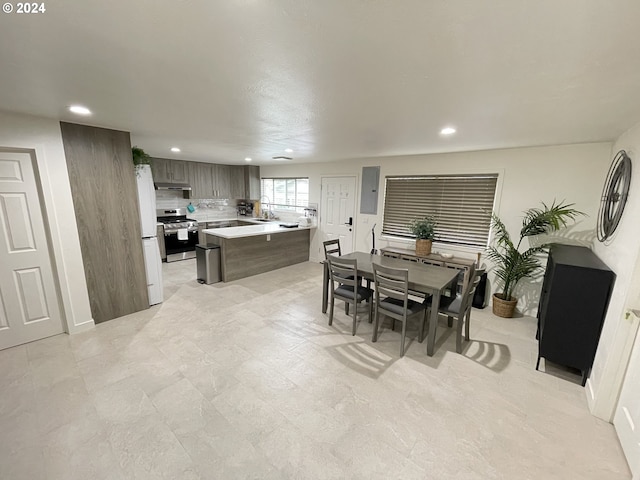 dining space featuring sink