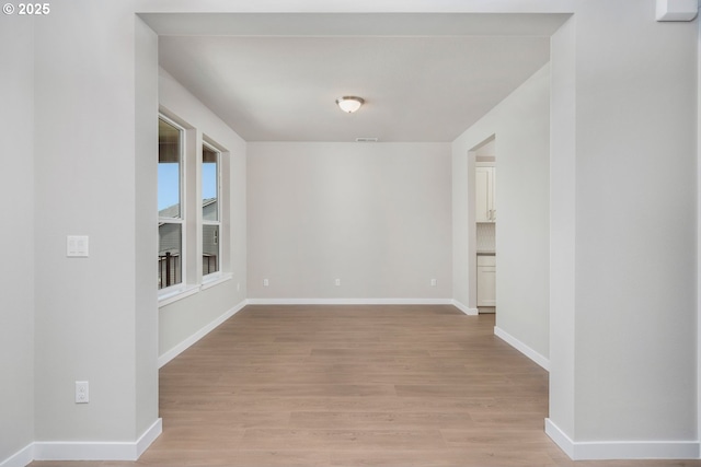 1643 NE Josephine Ct Unit 175, Estacada, OR 97023 - unfurnished room featuring light wood finished floors and baseboards