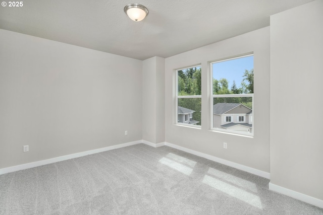 1643 NE Josephine Ct Unit 175, Estacada, OR 97023 - empty room with baseboards and carpet floors