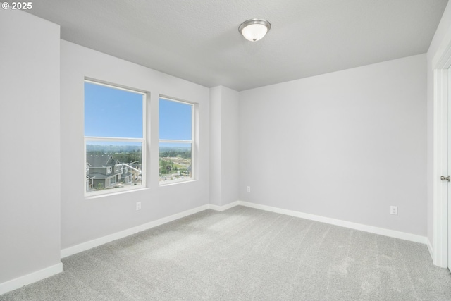 1643 NE Josephine Ct Unit 175, Estacada, OR 97023 - carpeted empty room with baseboards