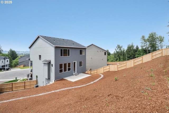 1643 NE Josephine Ct Unit 175, Estacada, OR 97023 - rear view of house featuring a fenced backyard and a patio area