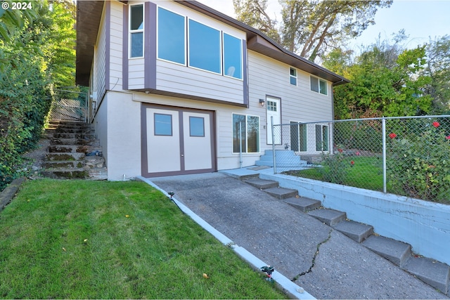 exterior space featuring a front lawn