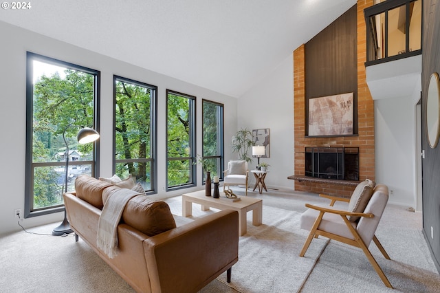 living room featuring a brick fireplace, light colored carpet, and high vaulted ceiling