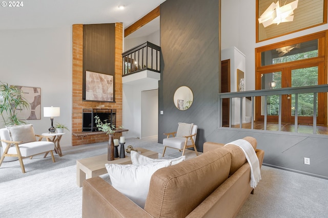 carpeted living room featuring beamed ceiling and high vaulted ceiling