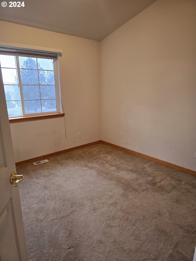 view of carpeted spare room