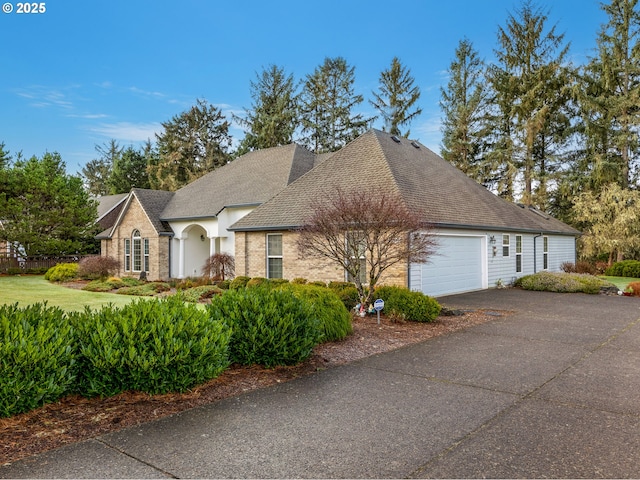 view of front of property featuring a garage