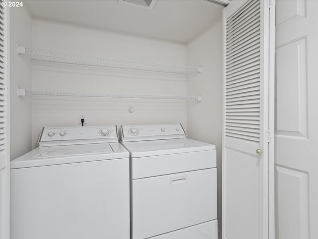 laundry room with washer and dryer