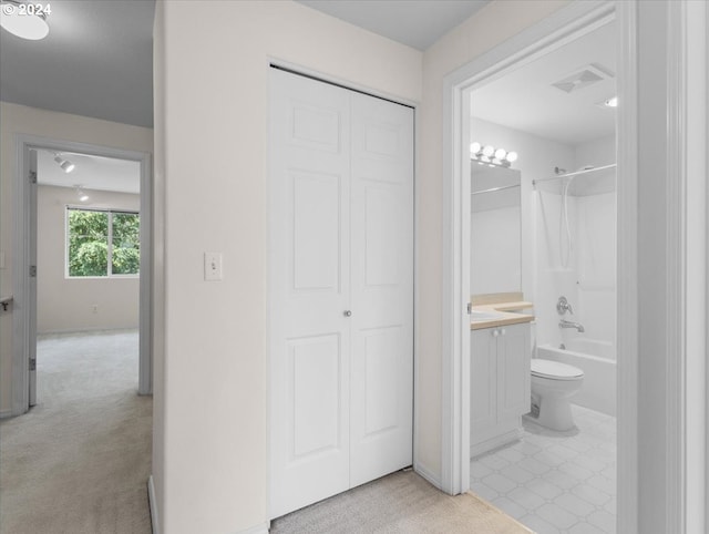 full bathroom featuring shower / tub combination, toilet, and vanity