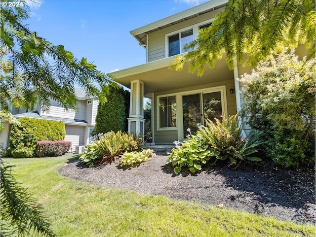 rear view of house with a yard