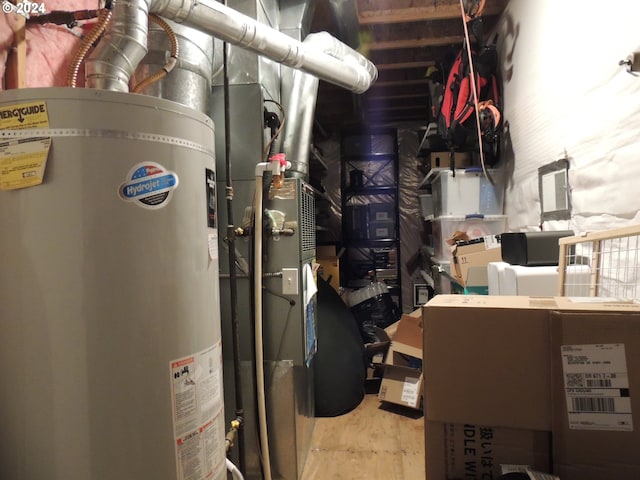 utility room with gas water heater