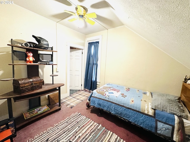 carpeted bedroom with a textured ceiling, ceiling fan, and lofted ceiling