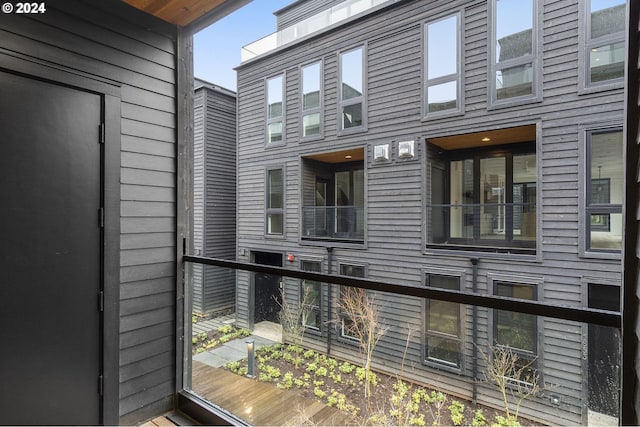 view of property exterior featuring a balcony