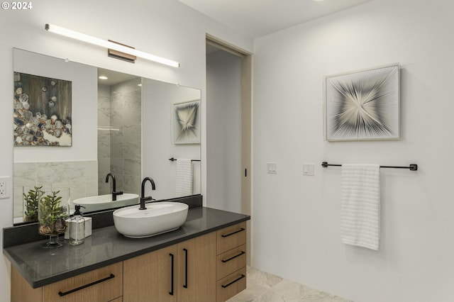 bathroom with tile flooring and vanity