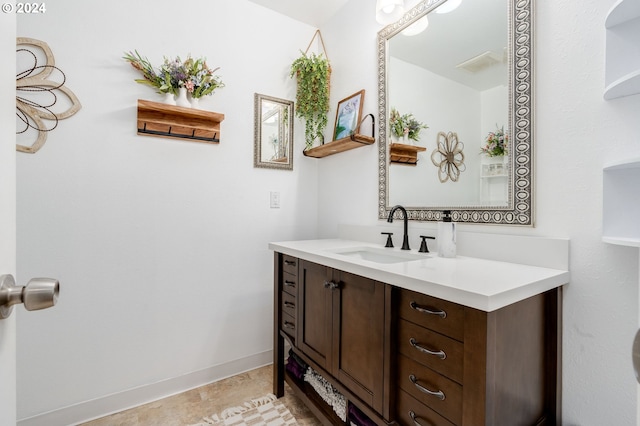 bathroom featuring vanity and tile patterned flooring