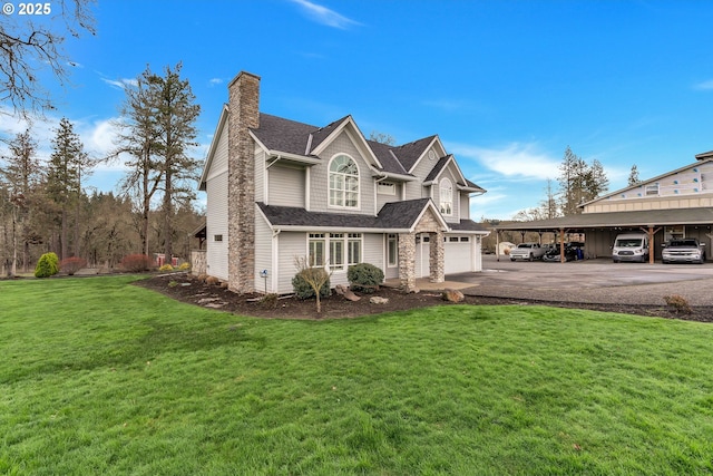 view of front of house featuring a carport and a front yard