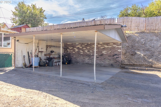 view of car parking featuring a carport