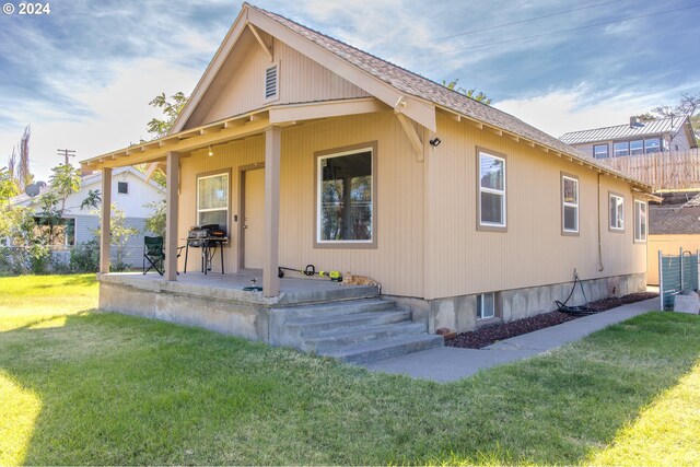 exterior space featuring a lawn