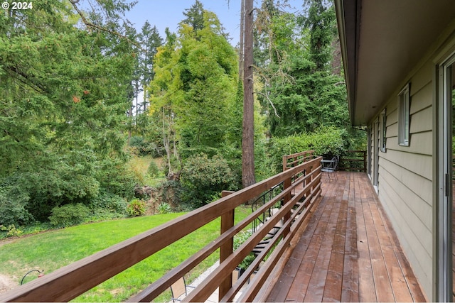 wooden balcony featuring a wooden deck