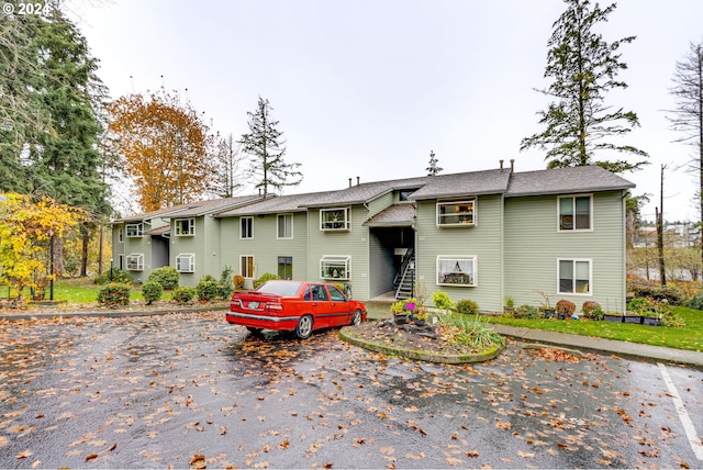 11990 SW Corby Dr Unit 16, Portland, OR 97225 - bi-level home featuring uncovered parking