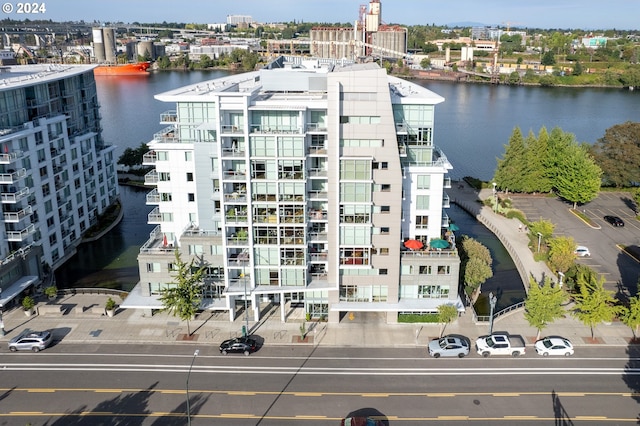 birds eye view of property featuring a water view