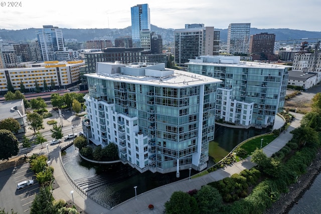 property's view of city with a water view