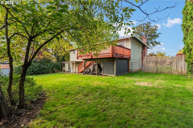 view of yard featuring a wooden deck