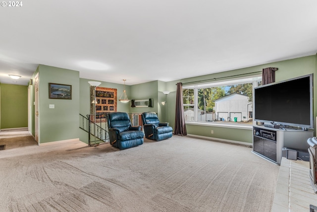 carpeted living room featuring a wall mounted air conditioner