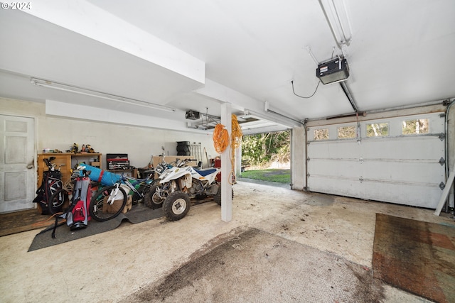 garage featuring a garage door opener