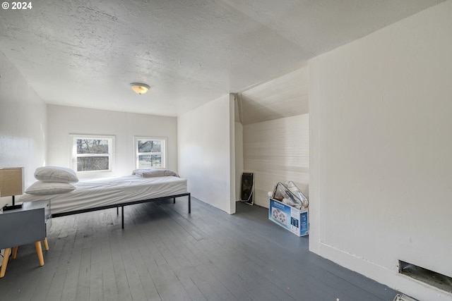 bedroom featuring wood-type flooring