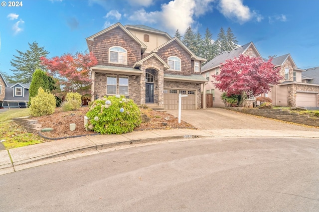 front of property with a garage