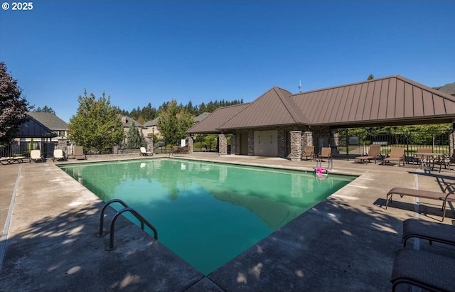 5310 NW Primino Ave, Portland, OR 97229 - community pool with a patio and fence