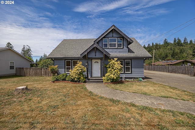 view of front of house with a front lawn