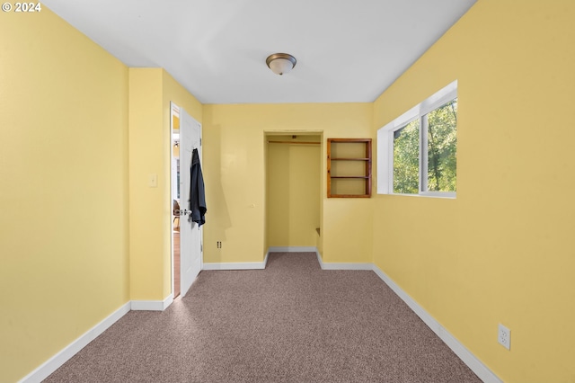 corridor with carpet floors