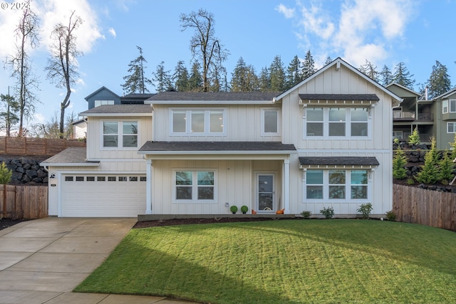 view of front facade with a garage and a front yard