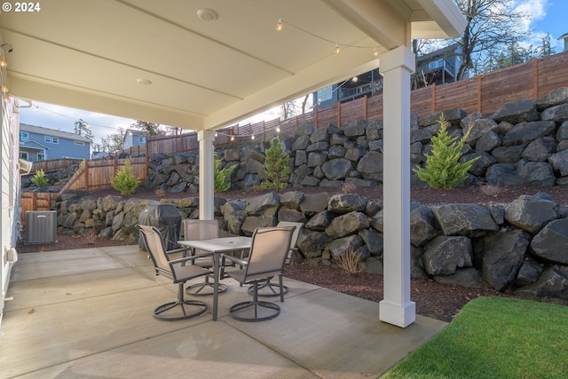 view of patio / terrace with central AC unit