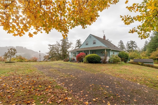 view of side of property featuring a mountain view