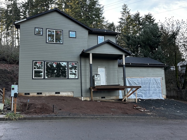 front of property featuring a garage