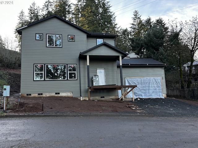 front of property featuring a garage