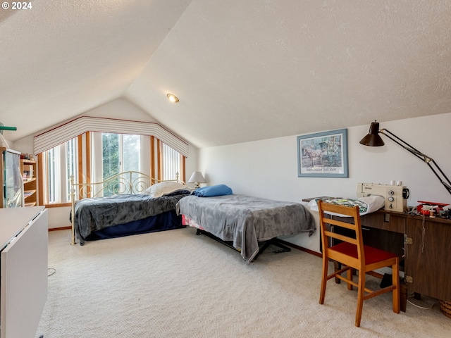 14355 NW Pheasant Hill Ln, Mcminnville, OR 97128 - bedroom featuring vaulted ceiling, light colored carpet, and a textured ceiling
