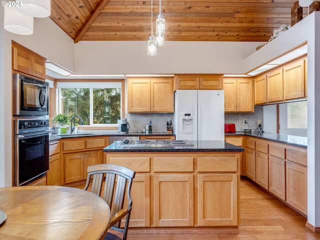 14355 NW Pheasant Hill Ln, Mcminnville, OR 97128 - kitchen with black appliances, wooden ceiling, a sink, decorative backsplash, and lofted ceiling