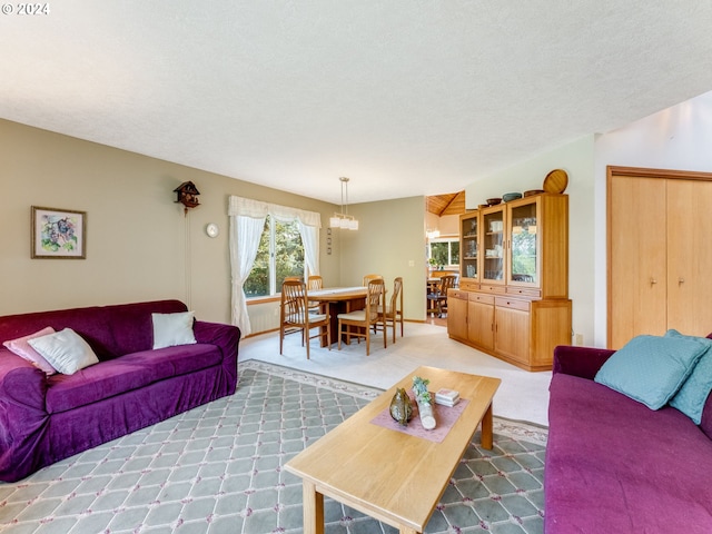 14355 NW Pheasant Hill Ln, Mcminnville, OR 97128 - carpeted living area with a chandelier