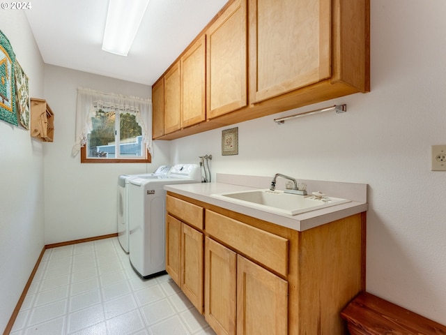 14355 NW Pheasant Hill Ln, Mcminnville, OR 97128 - laundry room with separate washer and dryer, cabinet space, light floors, and baseboards