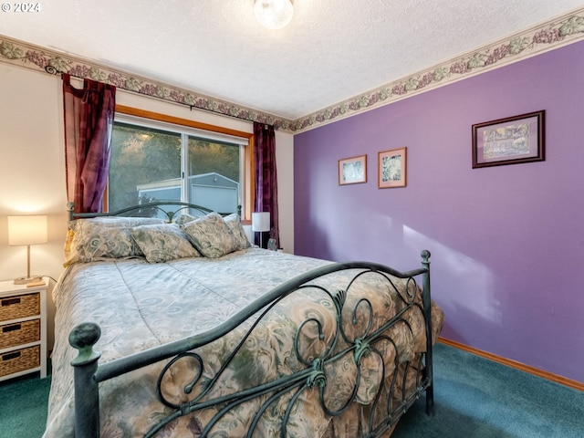 14355 NW Pheasant Hill Ln, Mcminnville, OR 97128 - carpeted bedroom featuring a textured ceiling and baseboards