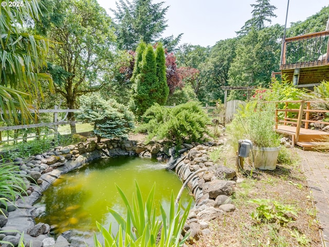 14355 NW Pheasant Hill Ln, Mcminnville, OR 97128 - view of yard featuring a garden pond and a deck