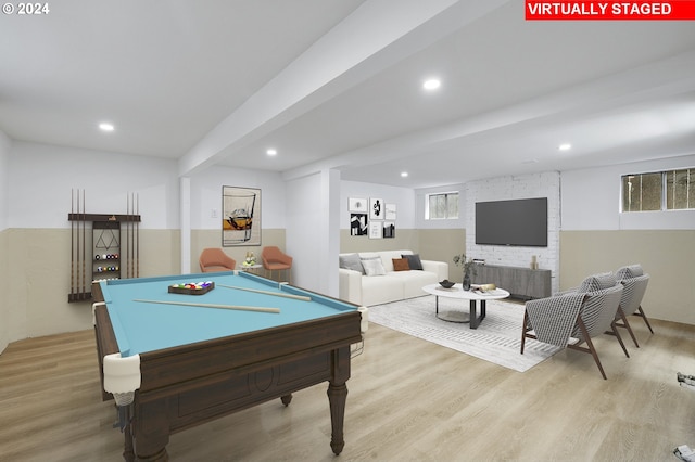 rec room featuring beamed ceiling, light hardwood / wood-style floors, and billiards