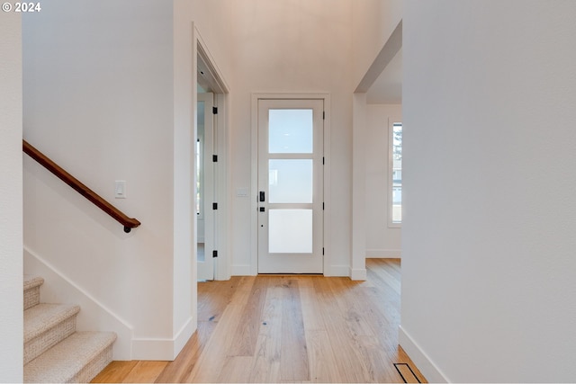 entryway with light hardwood / wood-style flooring