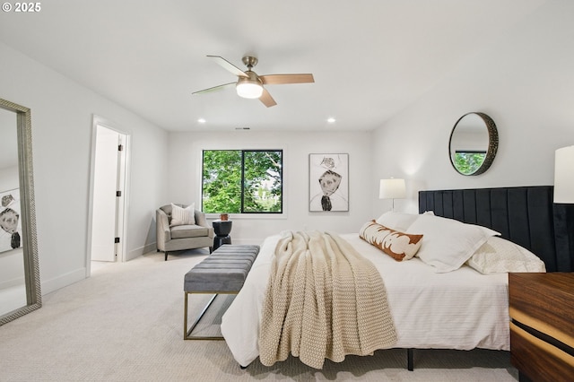 carpeted bedroom featuring baseboards, ceiling fan, and recessed lighting