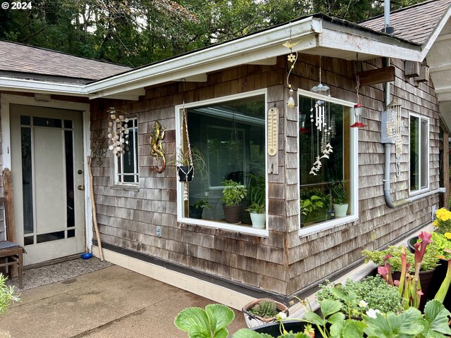 doorway to property featuring a patio