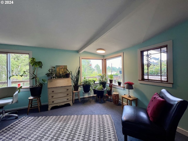 sitting room featuring carpet, lofted ceiling with beams, and plenty of natural light