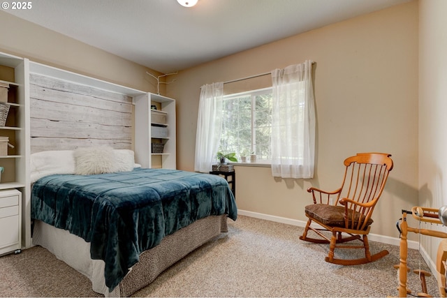 bedroom with light carpet